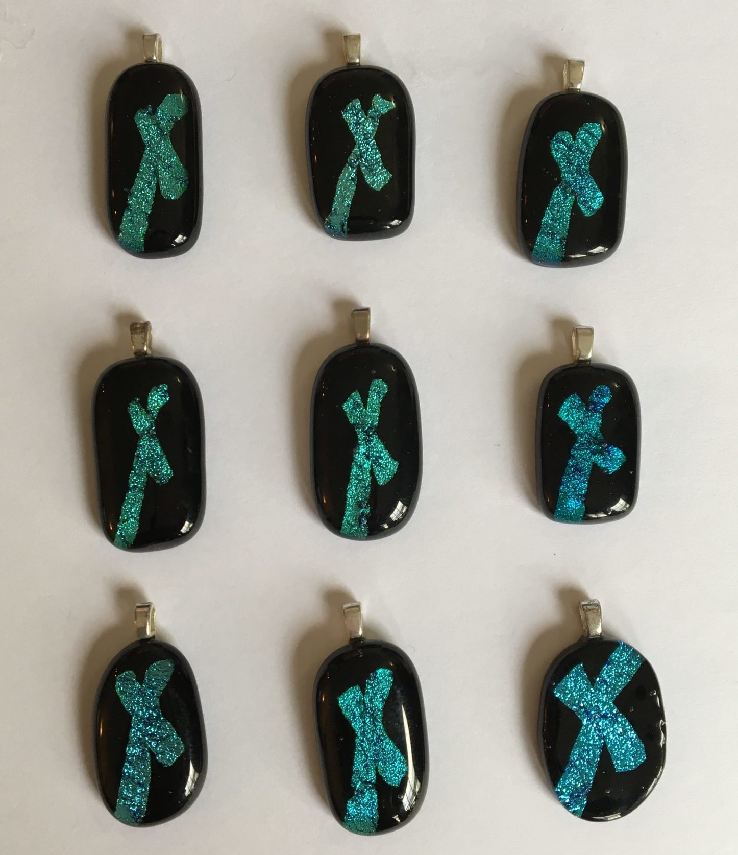 X Pendants