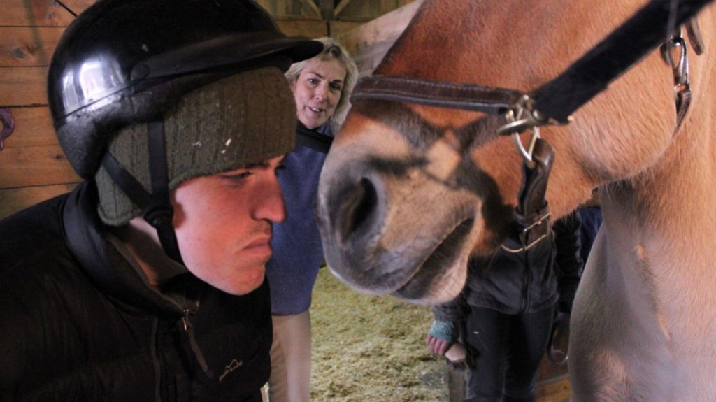 Andy Tranfaglia, who has Fragile X, with Daniela Morse and Aurora the horse Andy Tranfaglia, who has Fragile X, with Daniela Morse and Aurora the horse
