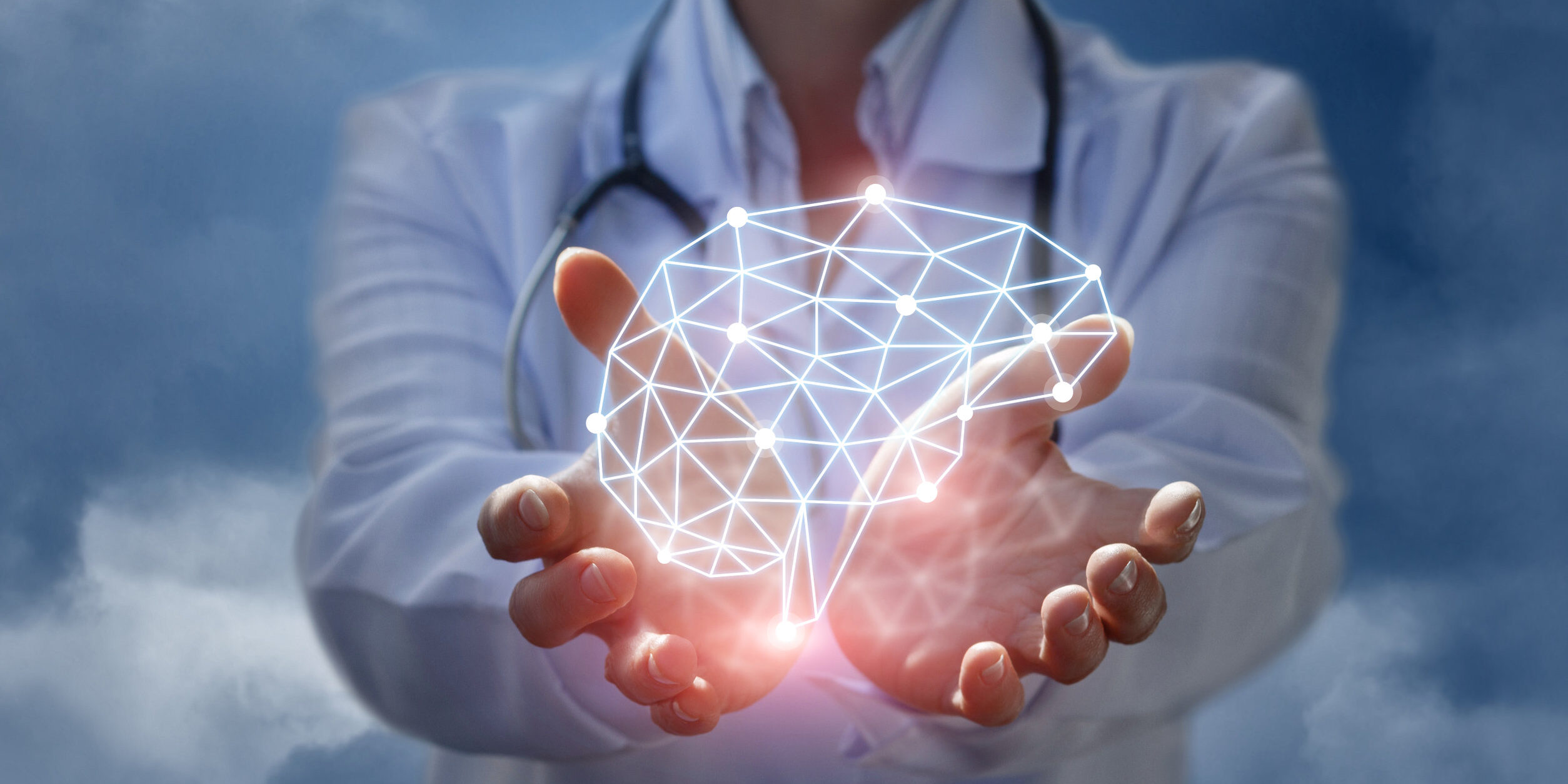 Doctor shows the model of brain thinking in hands . Doctor shows the model of brain thinking in hands on blue background.
